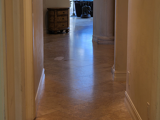 dull travertine floor before restoration
