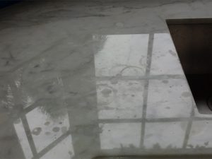 badly etched carrara marble countertop